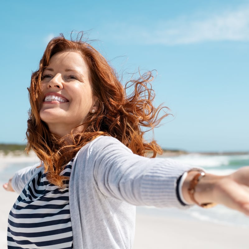 woman smiling on a sunny day